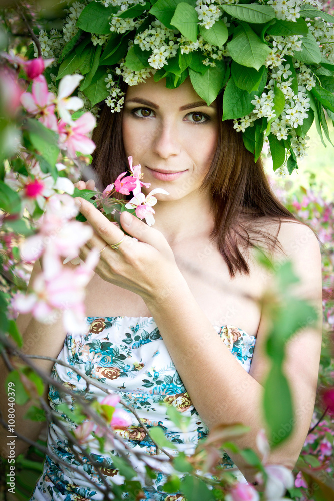 Beautiful young woman in the spring garden Beautiful young woman in the spring garden