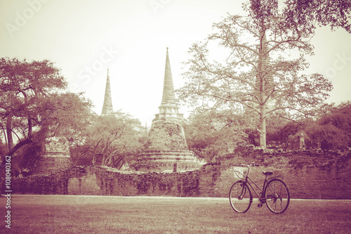 Toning,Classic and vintage bicycle with ancient temple backgroun © googibga