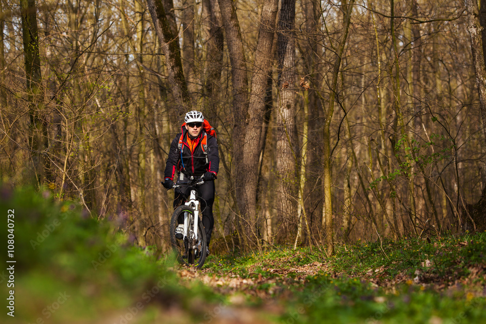 Mountain Bike cyclist riding single track Mountain Bike cyclist riding single track