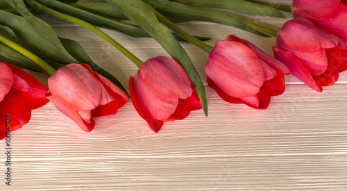 Fototapeta Naklejka Na Ścianę i Meble -  Tulips on wooden background