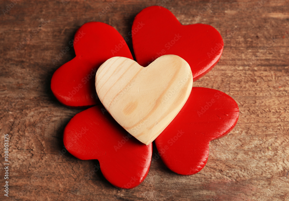 Obraz premium Wooden hearts on rustic wooden background