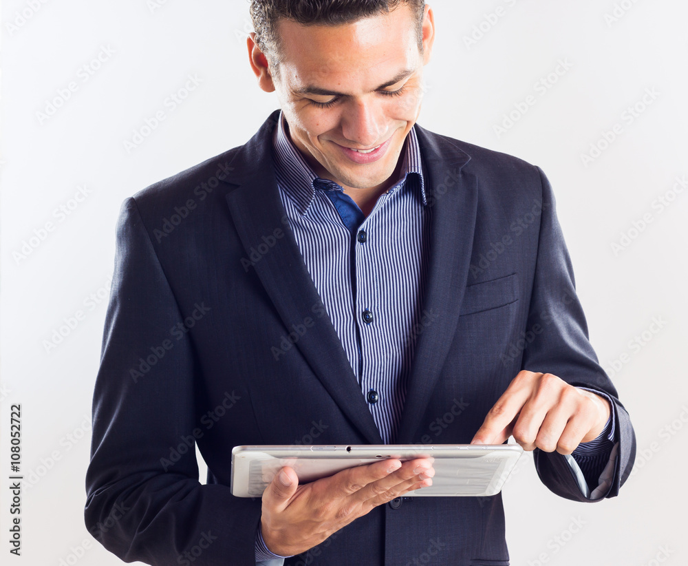 man holding a tablet checking his finance man holding a tablet checking his finance