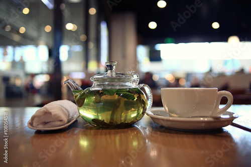 green tea in a teapot photo