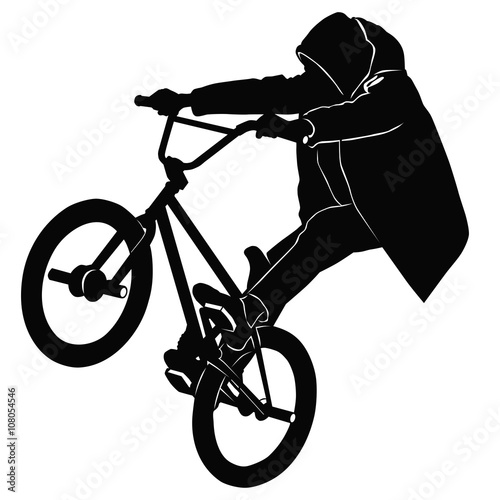 Teenager riding a BMX bicycle