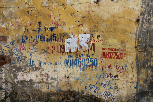 Distressed wall with graffiti