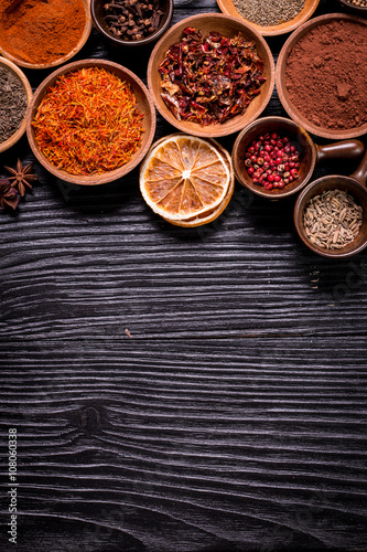 Fototapeta Naklejka Na Ścianę i Meble -  spices and herbs on wooden table.