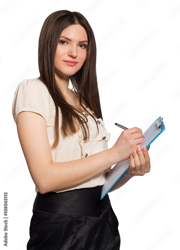 Portrait of smiling business woman writing on clipboard Portrait of smiling business woman writing on clipboard