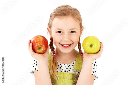 Beautiful smart young girl holding apples