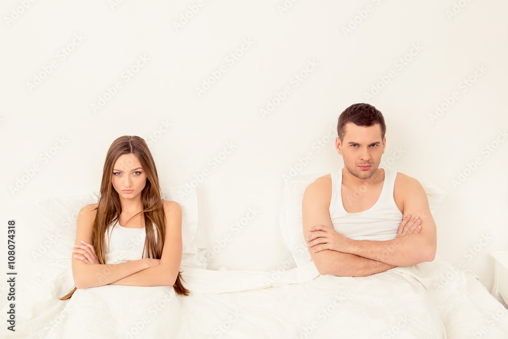 Upset young couple having marital problems or a disagreement in Upset young couple having marital problems or a disagreement in