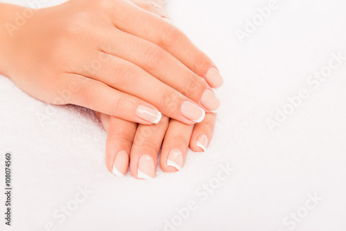Fototapeta Naklejka Na Ścianę i Meble -  Close up photo of woman's hands with perfect manicure