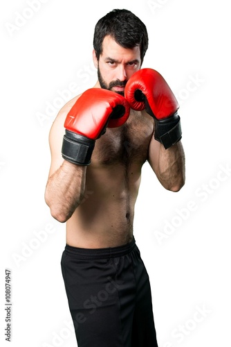 Sportman with boxing gloves © luismolinero