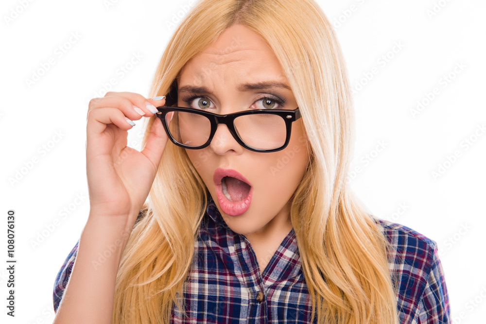 Close up portrait of surprised woman in glasses with open mouth