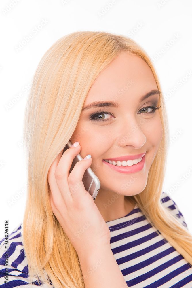 Close up portrait of young smiling girl talking on phone Close up portrait of young smiling girl talking on phone