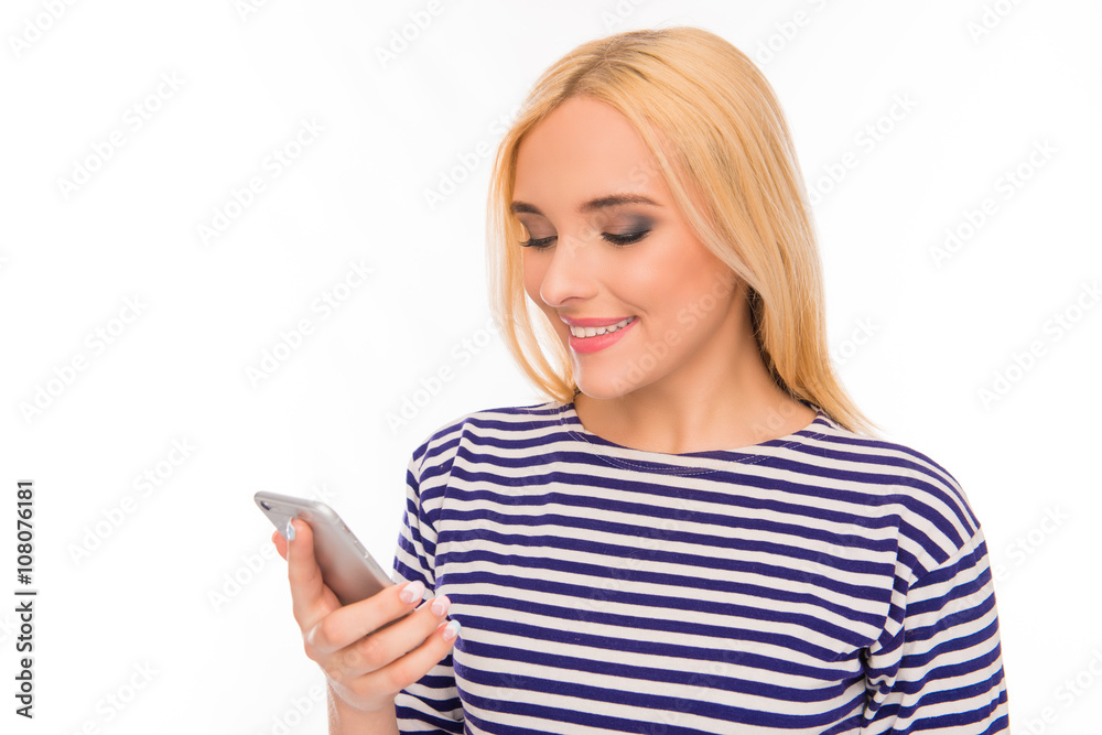 Portrait of happy beautiful woman holding phone and reading mess Portrait of happy beautiful woman holding phone and reading mess