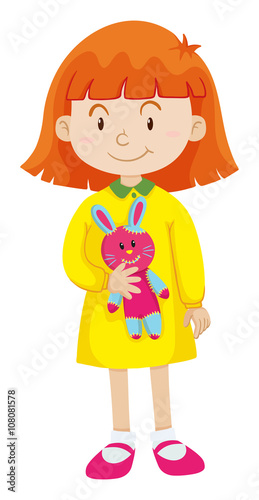 Little girl with rabbit doll