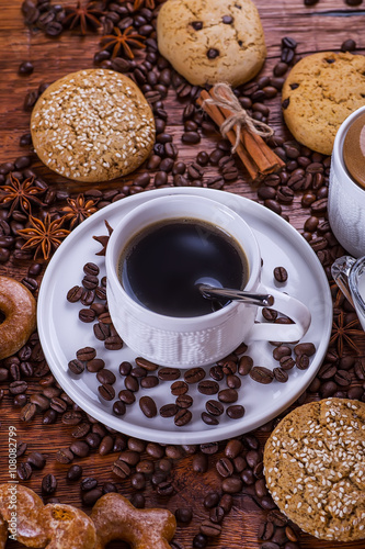 black coffee on a wooden background © mitsyko1971