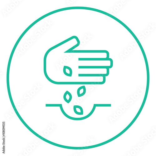 Hand planting seeds in ground line icon.