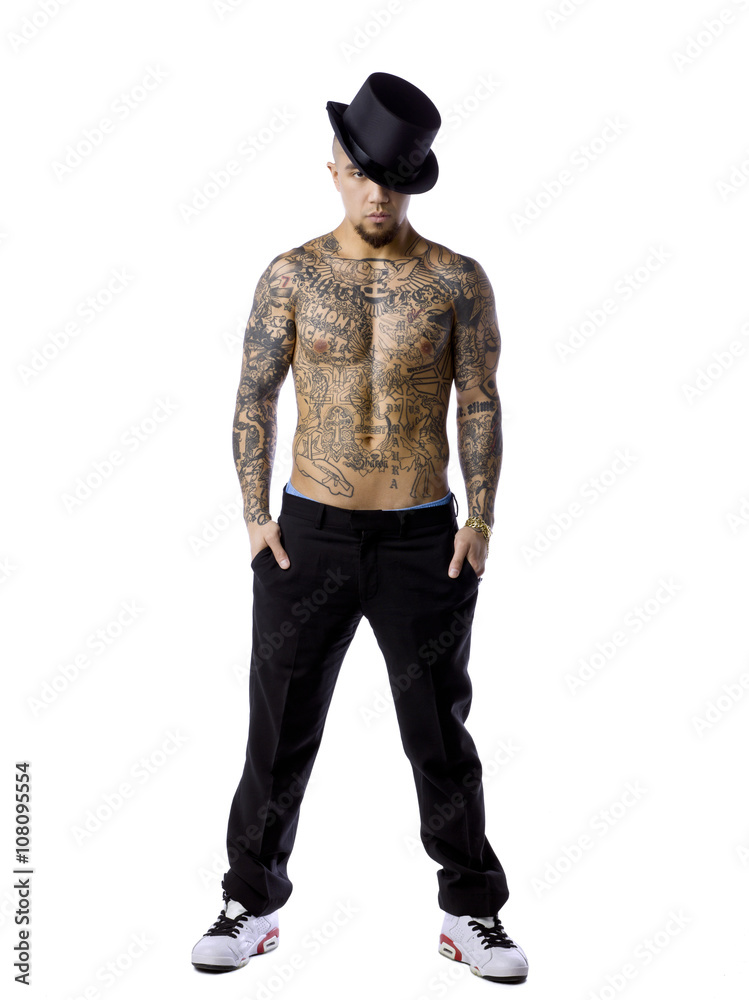 shirtless young man with tattoo on his body. shirtless young man with tattoo on his body.