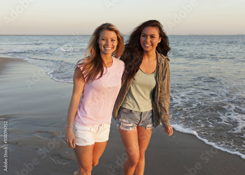 Women walking on beach
