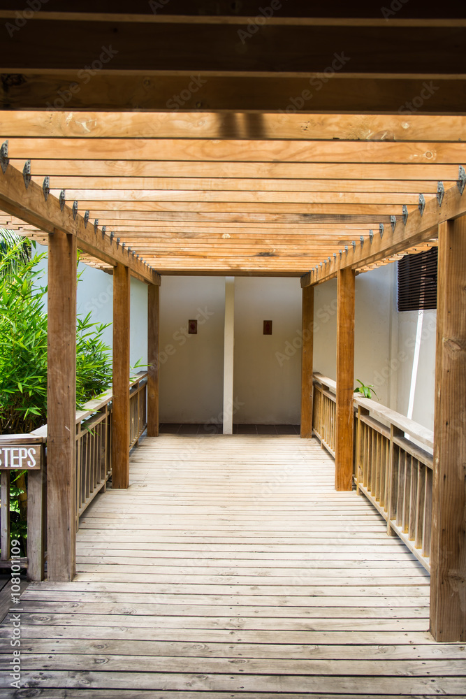 wooden beams along a wooden floor path