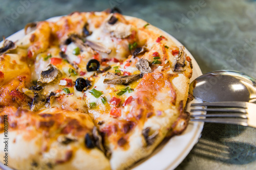 Delicious Italian vegetarian pizza with healthy ingredients.