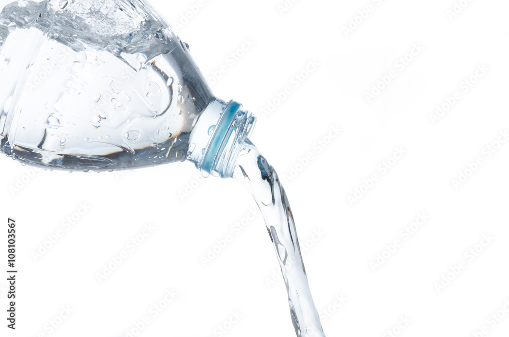 pouring water from a bottle on white background pouring water from a bottle on white background