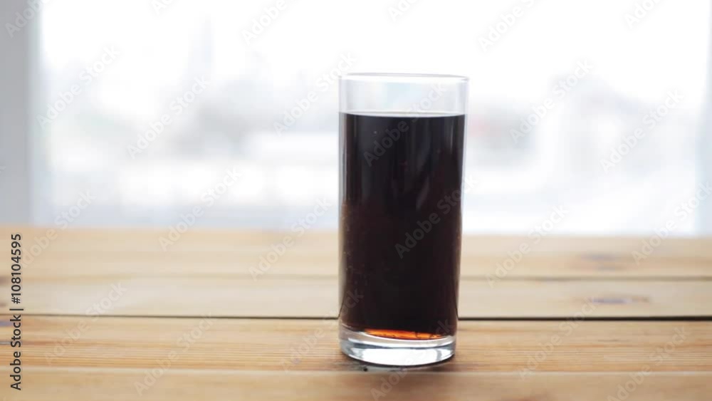 glass of lemonade or soda drink on wooden table glass of lemonade or soda drink on wooden table