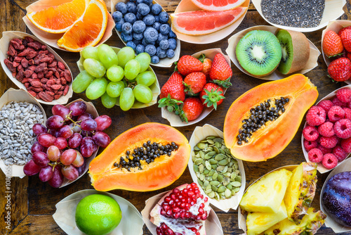 Fototapeta Naklejka Na Ścianę i Meble -  Fruits, berries, nuts, seeds top view.Healthy, super food concept.