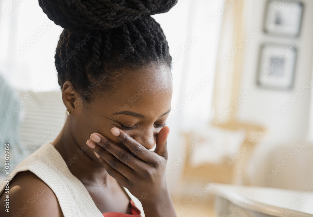 © JGI/Jamie Grill/Blend Images - Close up of woman laughing