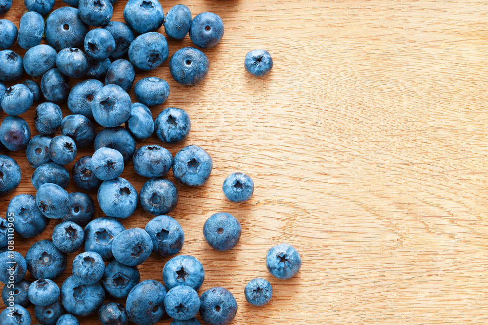 Healthy blueberries on wooden background. Close up, top view, high resolution product. Harvest Concept Healthy blueberries on wooden background. Close up, top view, high resolution product. Harvest Concept