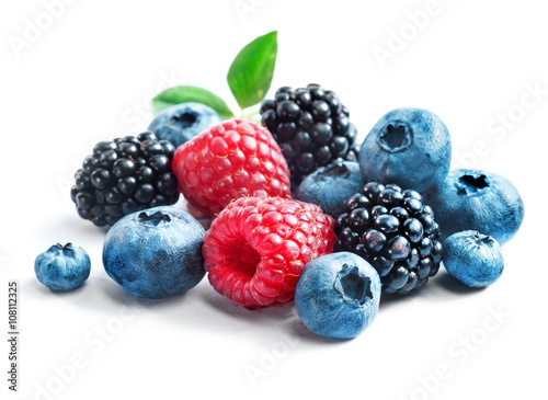 Blueberries, raspberries and blackberries on white background. Close up, high resolution product. Harvest Concept