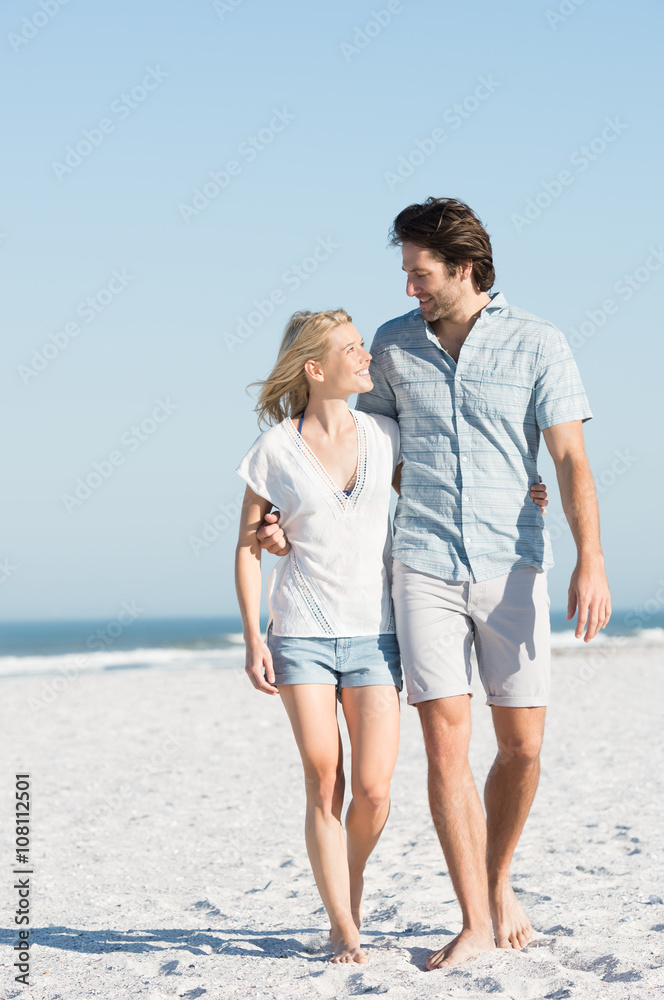 Couple embracing at beach