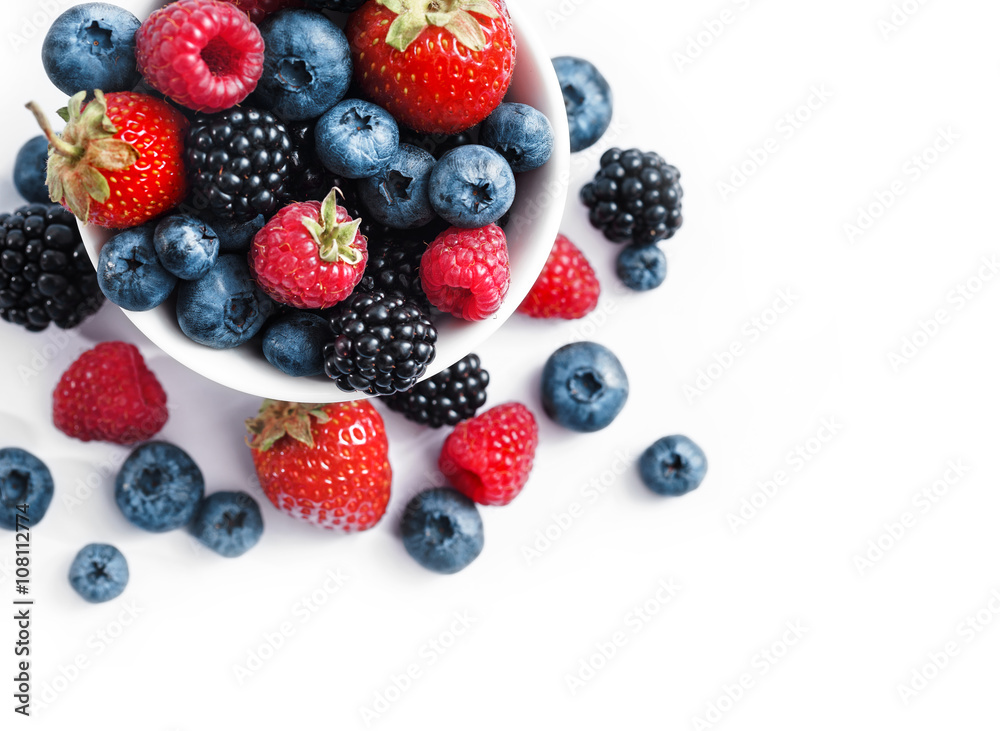 Ceramic bowl with blueberries, strawberries and blackberries on white background. Close up, high resolution product. Harvest Concept Ceramic bowl with blueberries, strawberries and blackberries on white background. Close up, high resolution product. Harvest Concept