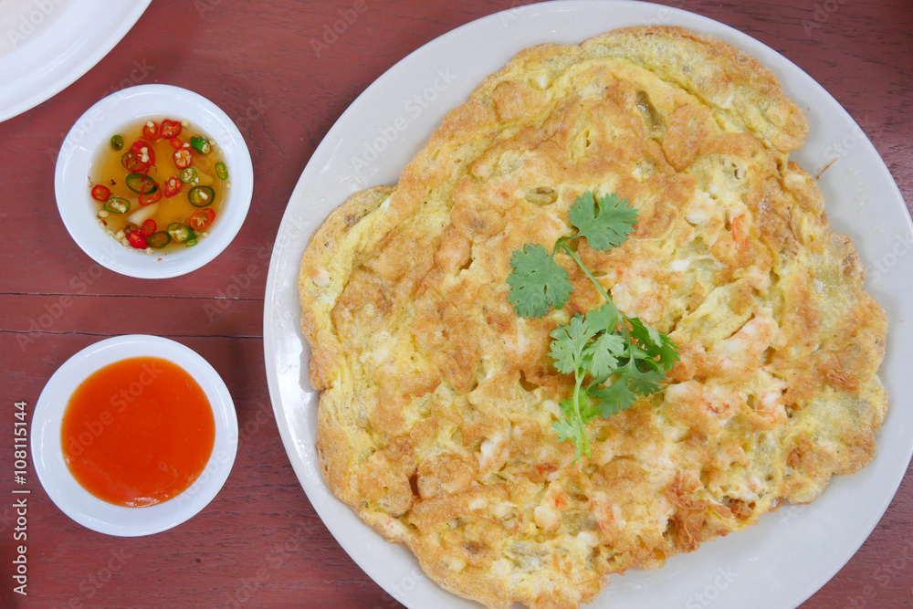 deep fried shrimp omelet with exotic dip sauce, top view deep fried shrimp omelet with exotic dip sauce, top view