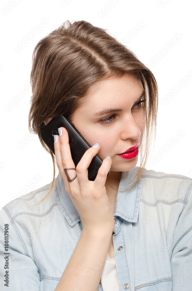 beautiful young woman speaks talking by mobile phone, on a white background beautiful young woman speaks talking by mobile phone, on a white background