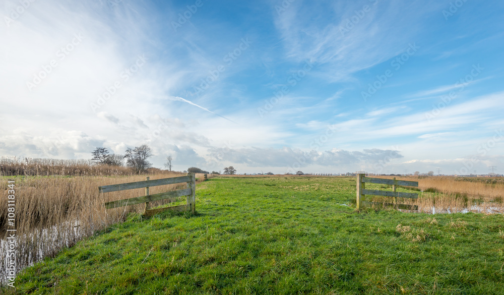 Rural landscape with wooden gates