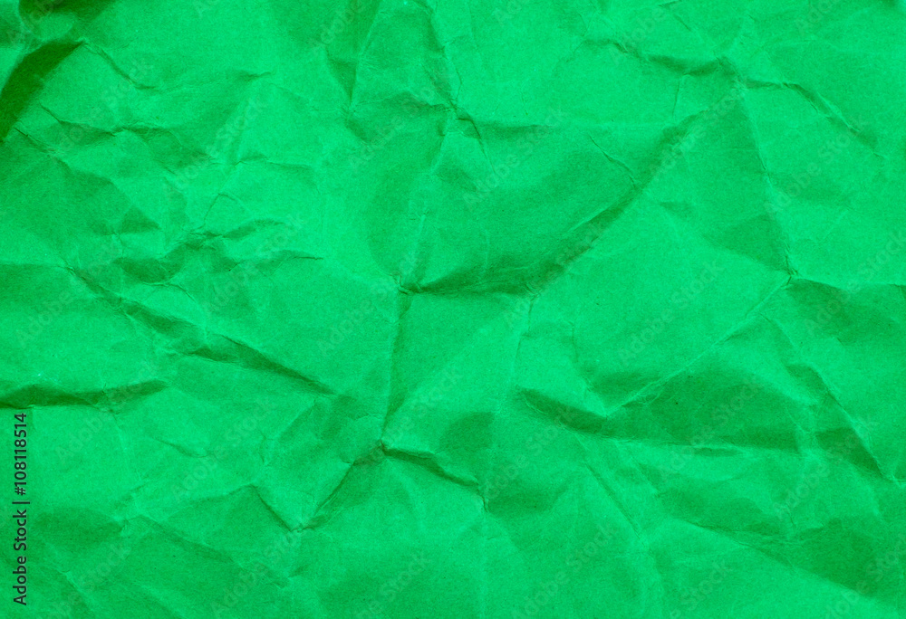 Fototapeta premium Green color crumpled paper texture background