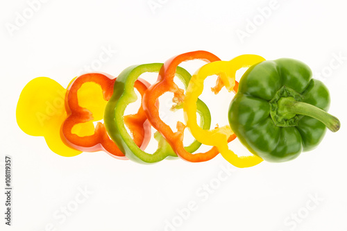 Fresh bell pepper sliced into rings, isolated on white