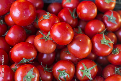 Bright red ripe tomatoes on market stall  © anna_rostova