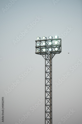 sportlights tower with background twilight photo