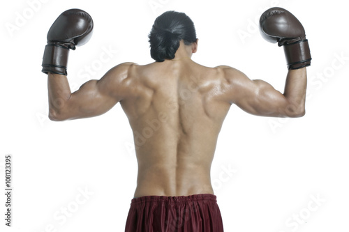 back of a muscular asian boxer