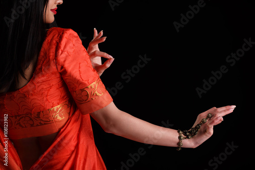 Beautiful young woman in traditional srai clothing with bridal makeup and jewelry.