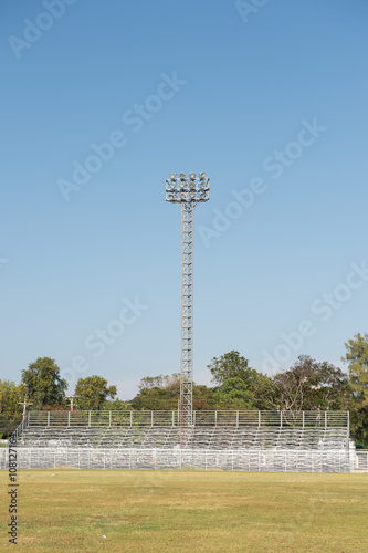 sportlights tower with blue sky background photo