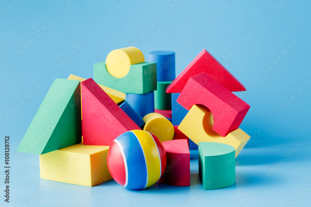 Children's toys on a blue background Children's toys on a blue background