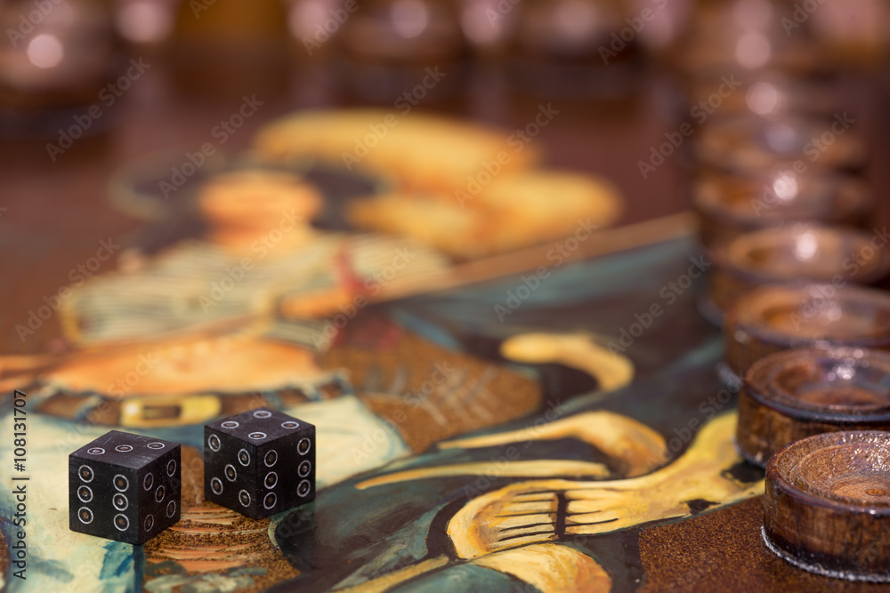 two dice and chips on the backgammon table two dice and chips on the backgammon table