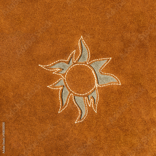 brown leather with sun design