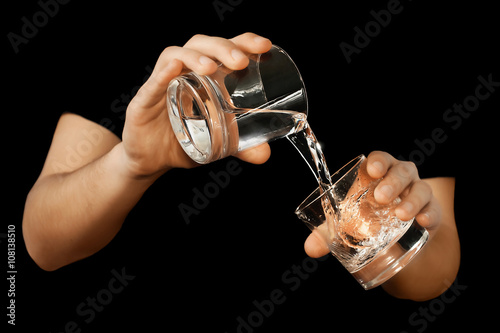 man filling a water glass