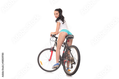 Fototapeta Naklejka Na Ścianę i Meble -  sexy girl with a bike