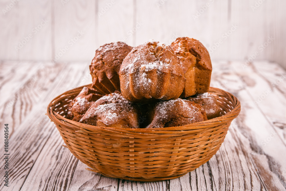 Cupcakes in a wicker breadbaskets Cupcakes in a wicker breadbaskets