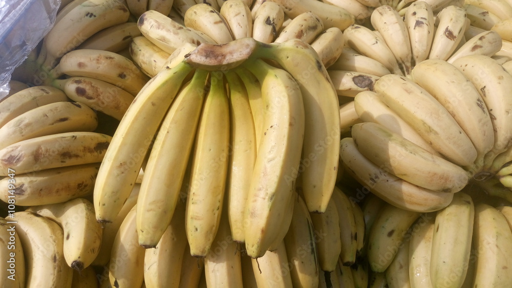 Directly above shot of fresh bananas for sale Directly above shot of fresh bananas for sale